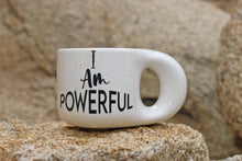 Load image into Gallery viewer, White mug with 'I Am Powerful' text on a stone surface
